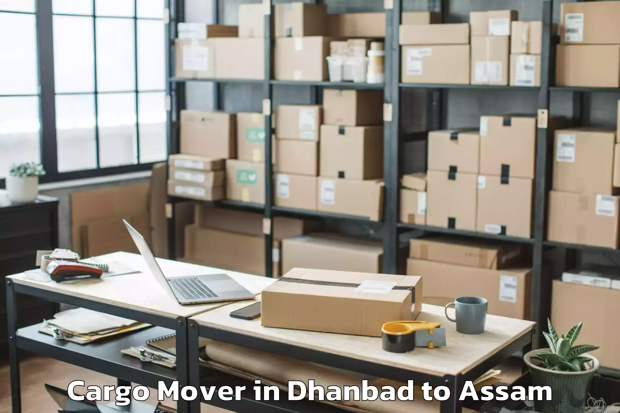 Top Dhanbad to Barpeta Road Cargo Mover Available